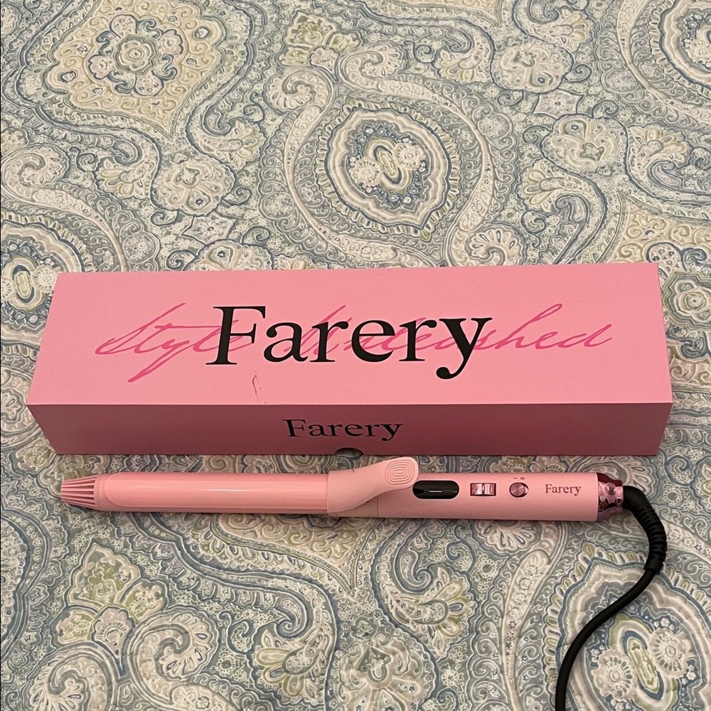 Farery 1 inch long barrel curling iron. Used once!